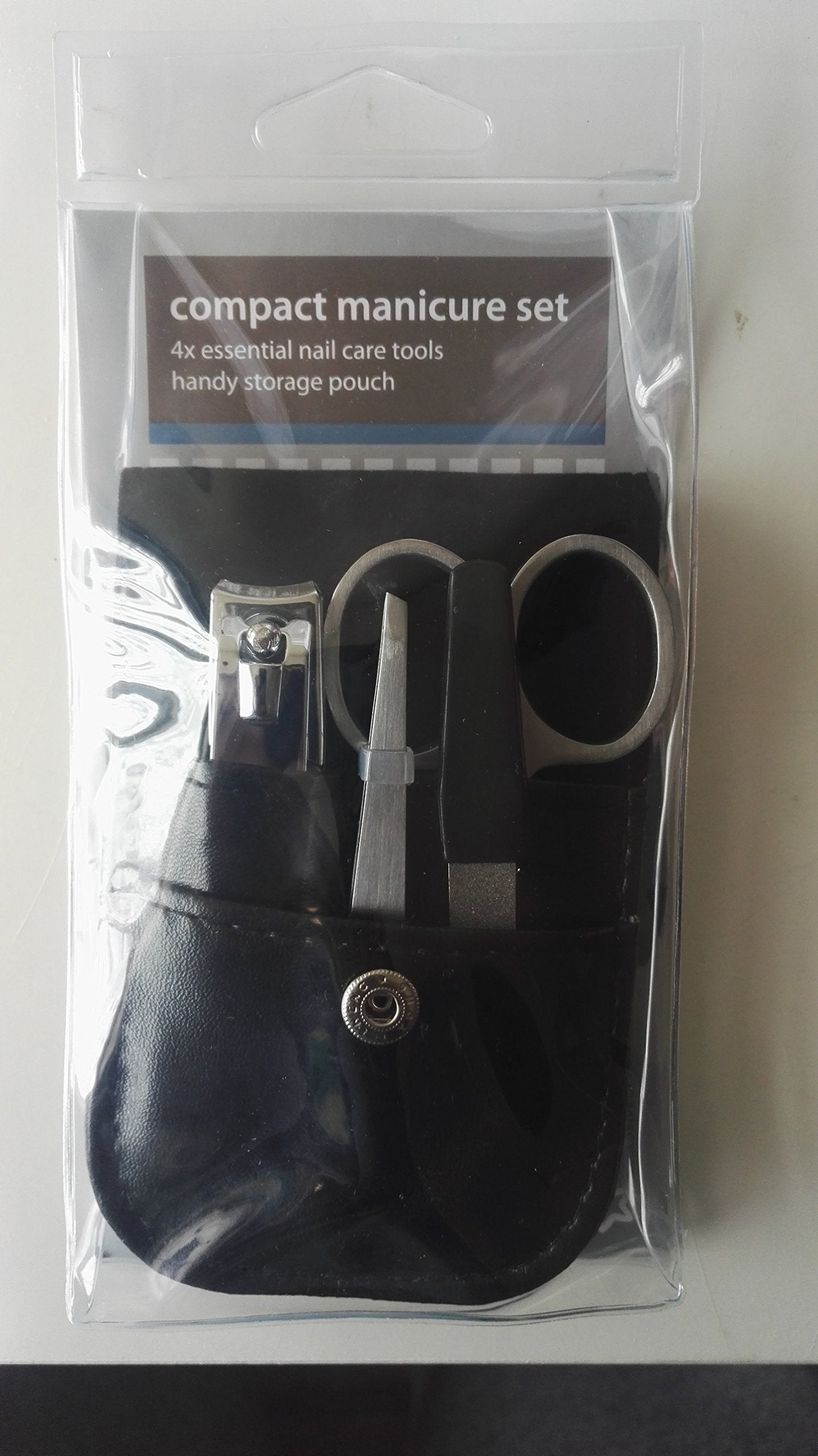 Compact manicure set with pouch