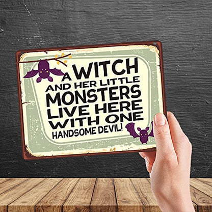 Kruzroyal MP437 A Witch and her little monsters live here with one handsome devil! / Family Sign Funny Novelty Retro Vintage Metal Wall Sign Plaque 20cm x 15cm