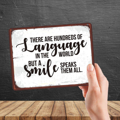 Kruzroyal MP184 There are hundreds of language in the world, but a smile speaks them all. Funny Novelty Retro Vintage Metal Wall Sign Plaque 20cm x 15cm